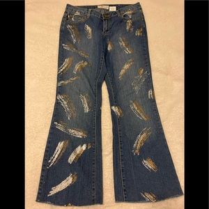 Crest paint streaked flare jeans